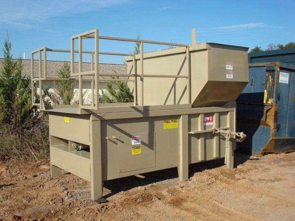 Stationary trash compactor